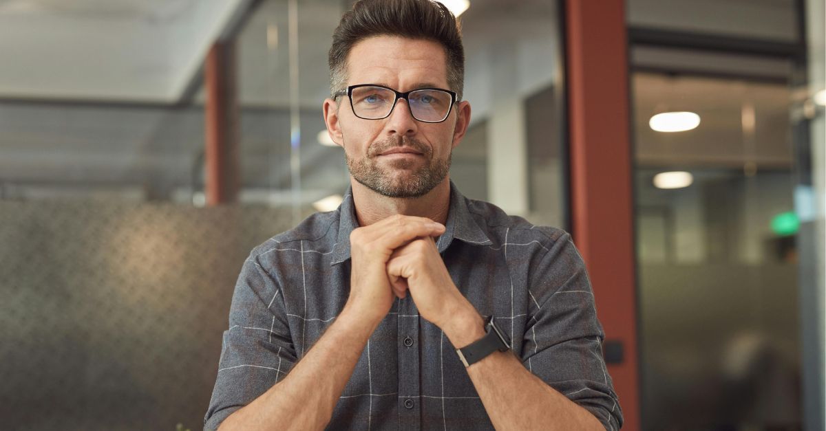 A Man Sitting at the Table