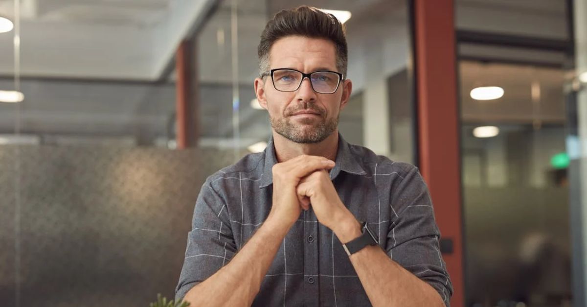 A Man Sitting at the Table