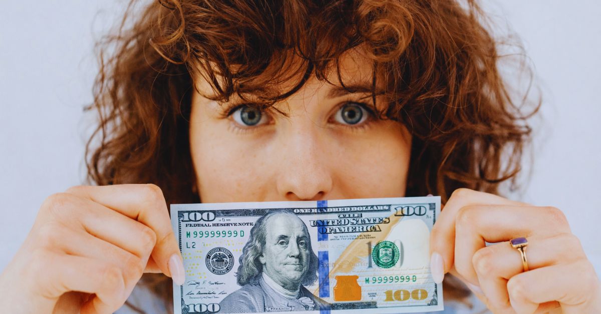 Woman with 100 Dollars