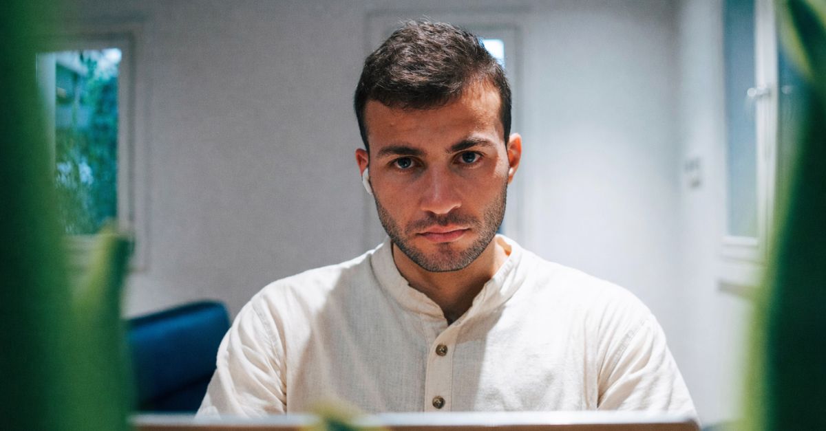 a guy looking into the camera