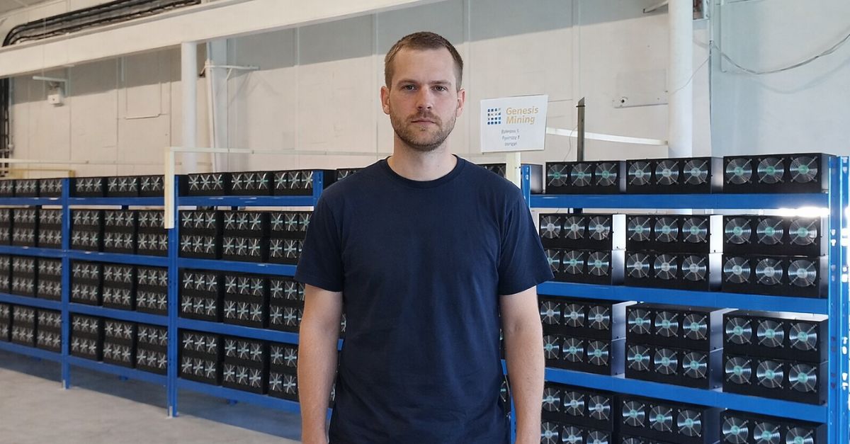 Person at a cryptocurrency mining farm