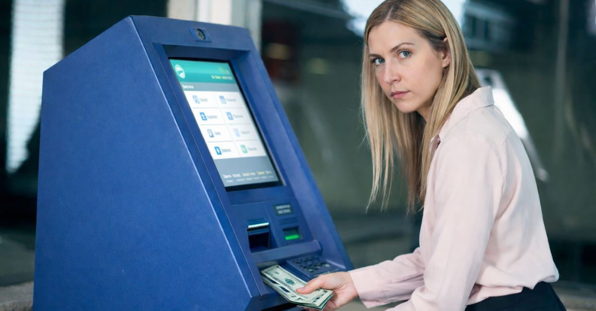 Woman using an ATM