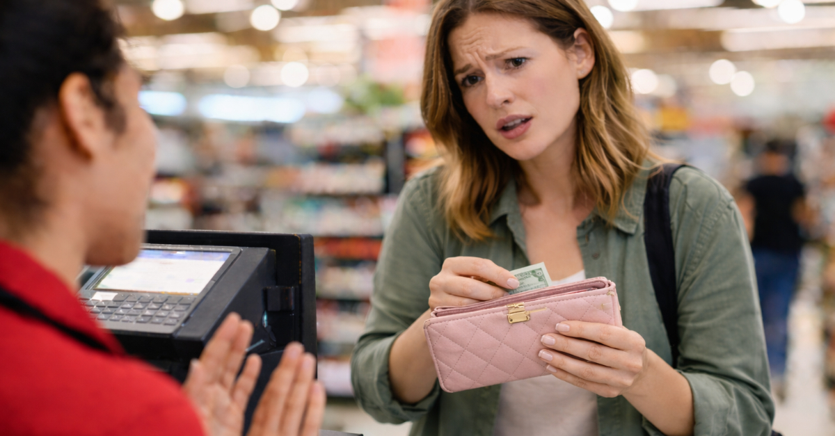 Woman at Grocery Store checkout