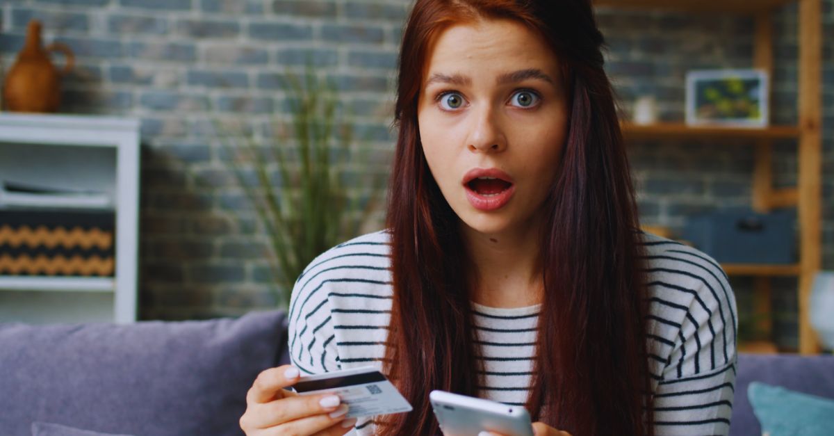 Shocked Woman With Credit Card