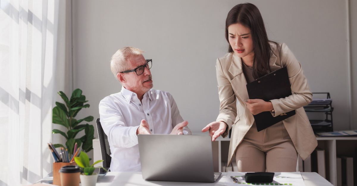 Business colleagues discussing project problems