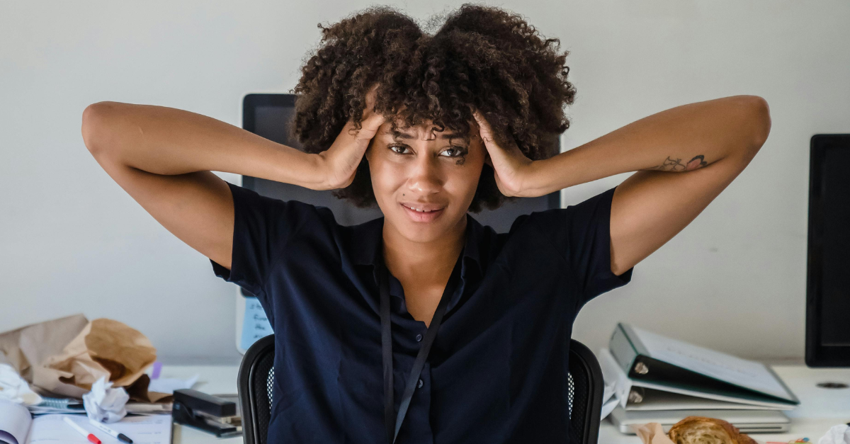 worried-looking-woman-sitting-in-the-office