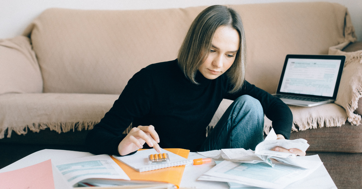 woman-in-black-long-sleeves-shirt-doing-accounting